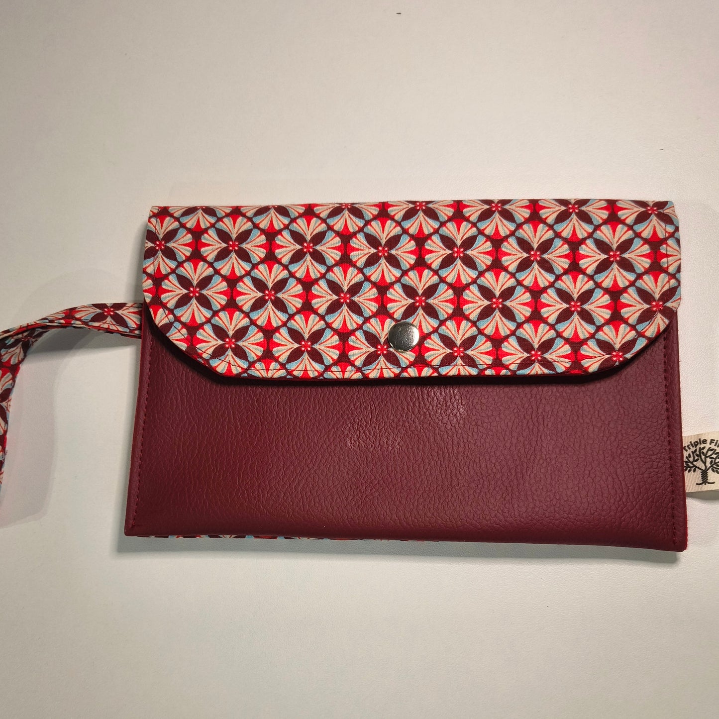 Pochette portefeuille graphique rouge bordeaux