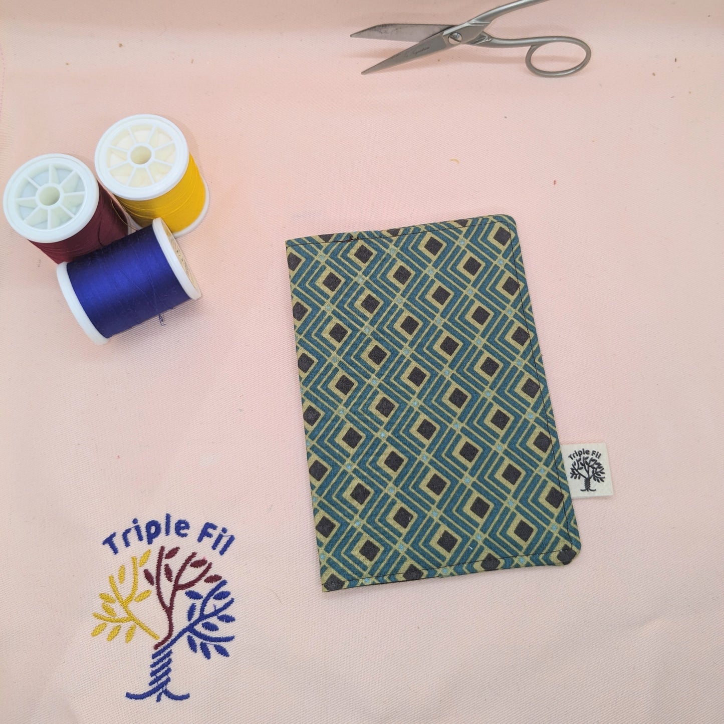 Pochette passeport graphique vert et marron